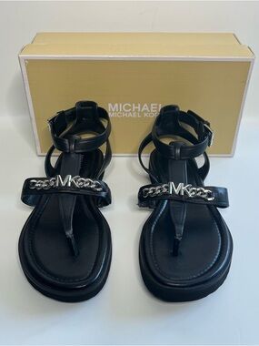 MICHAEL KORS New w/Box. Black Leather Silver LOGO Charm Farrow Thong Sandals